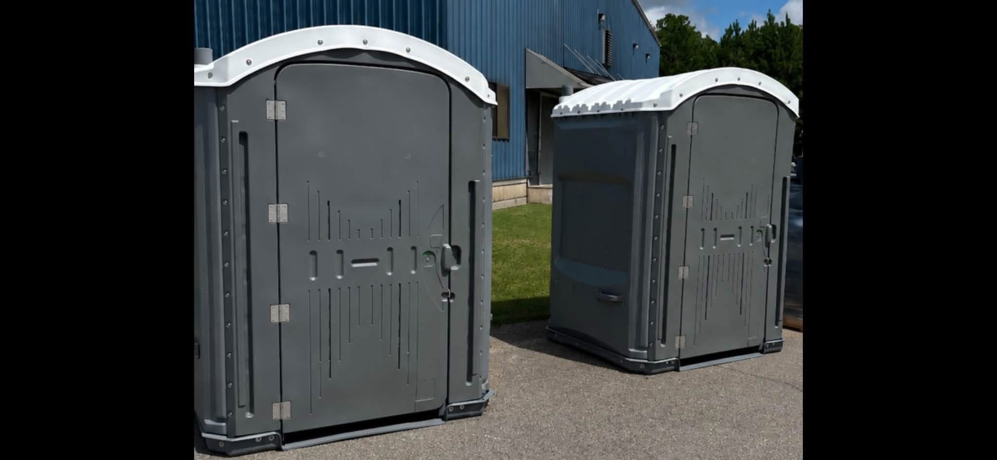 Gray ADA accessible portable restroom units